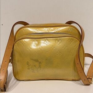 Louis Vuitton Shimmering Gold Bag-pack. Some stain